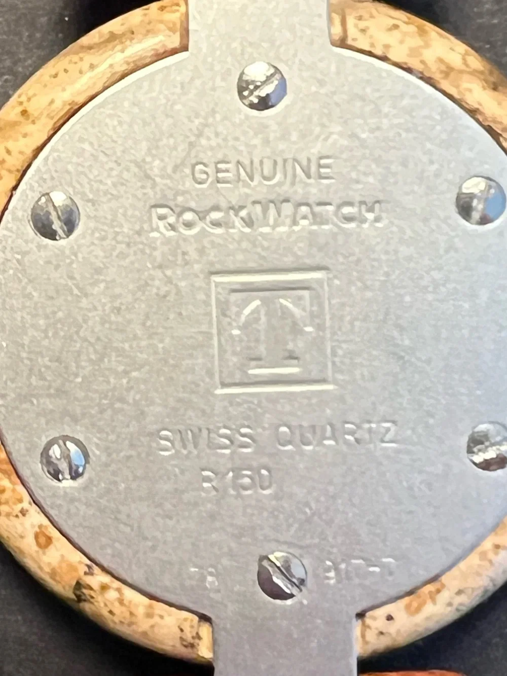 Tissot Beige Round Rock Watch with Red and Yellow Hands